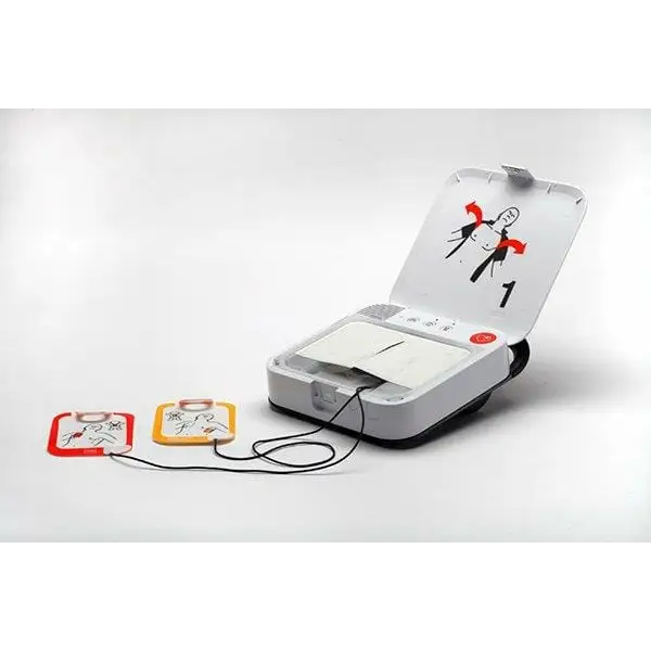 LifePak CR2 AED open with pads on the table