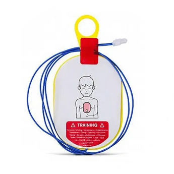 Training pad with red and yellow edges, blue wires, white background, child illustration, warning label.