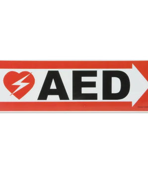 An AED wall sign with an arrow pointing right